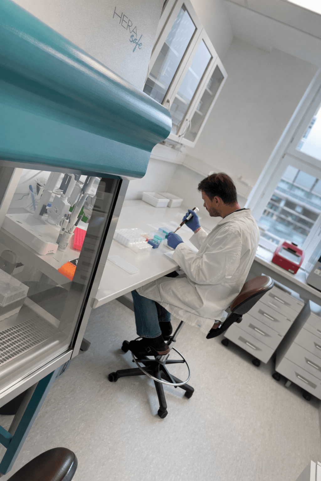 Pipetting samples at Atlas